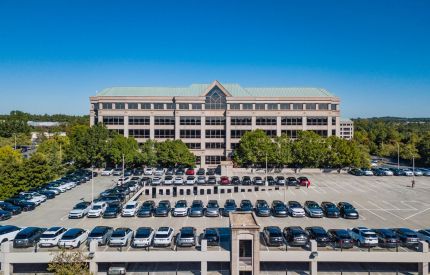 Aerial view of a Mansell Overlook office building and parking